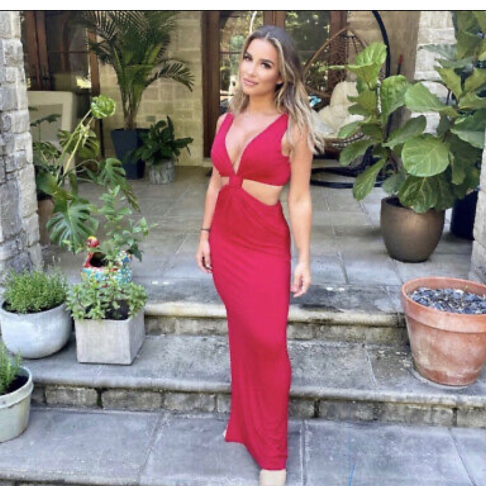 Kittenish red side cut out dress with slit